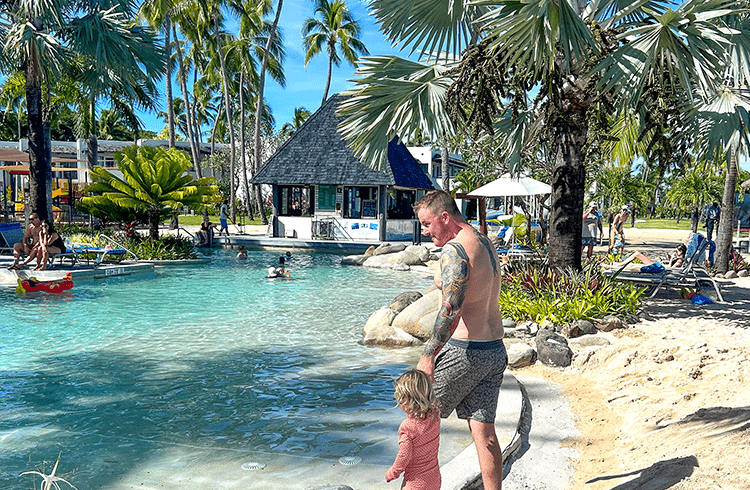 Mark and Zoey go swimming in the Sheraton pool in Fiji