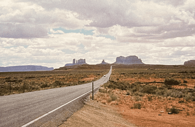 Driving towards Monument Valley. Photo taken on a film camera in 1999