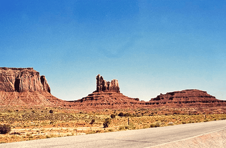 Driving through Monument Valley. Photo taken on a film camera in 1999
